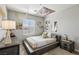 Comfortable bedroom featuring a bed with stylish decor and a window offering natural light at 3903 Henny Ave, Las Vegas, NV 89141