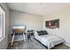 This light and airy bedroom features a neutral color palette and sleek, modern furnishings at 3903 Henny Ave, Las Vegas, NV 89141
