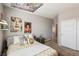 Cozy bedroom showcasing a well-decorated bed, closet, and a peaceful ambiance at 3903 Henny Ave, Las Vegas, NV 89141