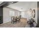 Inviting dining area with seating for four, a window, and view to the entryway at 3903 Henny Ave, Las Vegas, NV 89141