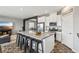 Modern kitchen with stainless steel appliances, a center island, and an adjacent breakfast area at 3903 Henny Ave, Las Vegas, NV 89141