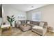 Large living room featuring a sectional sofa, neutral decor, and ample seating for a relaxing and inviting atmosphere at 3903 Henny Ave, Las Vegas, NV 89141