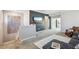 Cozy second story living area with modern decor and plenty of natural light at 3903 Henny Ave, Las Vegas, NV 89141