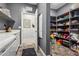 Well-organized pantry with door, offering generous storage space with shelves at 3903 Henny Ave, Las Vegas, NV 89141
