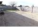 Large backyard with partial artificial turf installation and concrete block perimeter wall at 4120 E Cincinnati Ave, Las Vegas, NV 89104