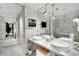 Elegant bathroom with marble countertops, double sinks, and modern fixtures, offering a luxurious experience at 4381 W Flamingo Rd # 1901, Las Vegas, NV 89103