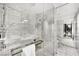 Contemporary bathroom featuring a glass-enclosed shower, marble finishes, and modern fixtures for a spa-like feel at 4381 W Flamingo Rd # 1901, Las Vegas, NV 89103