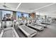Well-equipped fitness center with state-of-the-art treadmills and expansive windows for natural light at 4381 W Flamingo Rd # 1901, Las Vegas, NV 89103