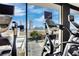 Cityscape view from gym, showcasing modern exercise equipment and bright, airy space at 4381 W Flamingo Rd # 1901, Las Vegas, NV 89103