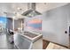Contemporary kitchen features stainless steel appliances and a breakfast bar with comfortable seating at 4381 W Flamingo Rd # 1901, Las Vegas, NV 89103