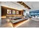 Luxurious lobby area with sleek black seating and colorful artwork creating a vibrant atmosphere at 4381 W Flamingo Rd # 1901, Las Vegas, NV 89103