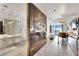 Contemporary condo featuring a marble bathroom, modern kitchen, and a comfortable bedroom with city views at 4381 W Flamingo Rd # 1903, Las Vegas, NV 89103