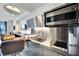 Close-up of modern kitchen with stainless steel countertops, appliances, and stylish overhead lighting at 4381 W Flamingo Rd # 1903, Las Vegas, NV 89103