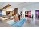 Bright and airy lobby with contemporary design, featuring a stylish rug and access to restaurant at 4381 W Flamingo Rd # 1903, Las Vegas, NV 89103