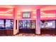 Mabel's BBQ restaurant entrance boasts neon lighting and brick accents, creating a vibrant dining atmosphere at 4381 W Flamingo Rd # 1903, Las Vegas, NV 89103