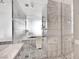 Spa-like shower featuring marble tile, glass enclosure, and a luxurious rain shower head at 4381 W Flamingo Rd # 1903, Las Vegas, NV 89103