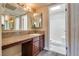Bathroom with vanity, granite counters and a walk-in shower at 5138 S Jones Blvd # 207, Las Vegas, NV 89118