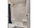 Bright bathroom with a walk-in shower and accessible seating at 5138 S Jones Blvd # 207, Las Vegas, NV 89118