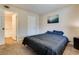 Comfortable bedroom featuring neutral walls, carpet, and natural light at 5138 S Jones Blvd # 207, Las Vegas, NV 89118