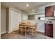 Cozy dining area with table and chairs, adjacent to kitchen and closet space at 5138 S Jones Blvd # 207, Las Vegas, NV 89118