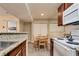 Eat-in kitchen featuring a table, chairs and closet storage at 5138 S Jones Blvd # 207, Las Vegas, NV 89118