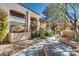 Beautiful condo community featuring landscaped grounds, walkways, and charming exterior architecture at 5138 S Jones Blvd # 207, Las Vegas, NV 89118