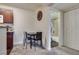 Dining area with a table and chairs, located adjacent to the kitchen and bathroom at 5166 S Jones Blvd # 202, Las Vegas, NV 89118