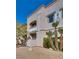 Condo exterior with second-floor balcony, desert landscaping, and building number 6 at 5166 S Jones Blvd # 202, Las Vegas, NV 89118