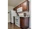 Functional kitchen features white appliances, including an oven, microwave, and refrigerator at 5166 S Jones Blvd # 202, Las Vegas, NV 89118