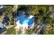 Aerial view of the community pool and recreational area with palms and shade structures at 5166 S Jones Blvd # 202, Las Vegas, NV 89118