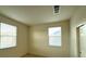 Bright bedroom with two windows and a closet at 5183 Silica Chalk Ave, Las Vegas, NV 89115