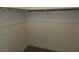 Walk-in closet with wall-mounted shelf, carpet, and white walls at 520 Arrowhead Trl # 1411, Henderson, NV 89015