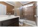 Stylish bathroom featuring a shower with glass enclosure and attractive mosaic tile design at 6136 Stanton Summit Dr, North Las Vegas, NV 89081