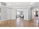 Spacious bonus room with large tile floors, leading into the bedroom at 6136 Stanton Summit Dr, North Las Vegas, NV 89081