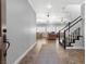 Welcoming entryway with staircase leading to living areas and dining area at 6136 Stanton Summit Dr, North Las Vegas, NV 89081