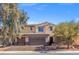 Charming two-story home with a three-car garage and well-maintained landscaping at 6136 Stanton Summit Dr, North Las Vegas, NV 89081