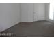 An empty bedroom featuring a closet and a large window at 833 Aspen Peak Loop # 2614, Henderson, NV 89011