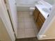 Bathroom features tiled floors, a vanity with sink, toilet and tub-shower combination at 8379 Drop Camp St, Las Vegas, NV 89123