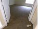 View into a bedroom with neutral carpet and walls at 8379 Drop Camp St, Las Vegas, NV 89123