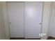 White sliding closet doors offering storage space in the bedroom at 8379 Drop Camp St, Las Vegas, NV 89123
