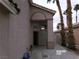 Inviting front entrance showcasing an open doorway and decorative stone accents at 8379 Drop Camp St, Las Vegas, NV 89123