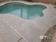 Private in-ground pool with surrounding concrete patio, perfect for outdoor relaxation at 8379 Drop Camp St, Las Vegas, NV 89123