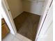 Cozy walk-in closet featuring neutral carpet flooring and ample storage space at 8379 Drop Camp St, Las Vegas, NV 89123