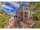 Beautiful home featuring a balcony, covered patio, and an outdoor cooking area for backyard enjoyment at 8953 Belconte Ln, Henderson, NV 89074