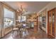 Eat-in kitchen with stainless steel appliances, a tile floor, and backyard views at 8953 Belconte Ln, Henderson, NV 89074