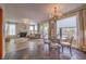 Combined living space featuring a fireplace, sitting area, and tile flooring at 8953 Belconte Ln, Henderson, NV 89074