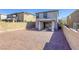 View of backyard with a gravel yard and a covered patio at 909 Cirrus Cloud Ave, Las Vegas, NV 89138