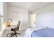Bedroom with a bed, desk and chair, and closet in view at 909 Cirrus Cloud Ave, Las Vegas, NV 89138
