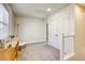 Bonus room/loft area with neutral carpet and plenty of natural light at 909 Cirrus Cloud Ave, Las Vegas, NV 89138