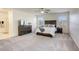 Spacious main bedroom features two large windows with natural light and a ceiling fan at 909 Cirrus Cloud Ave, Las Vegas, NV 89138